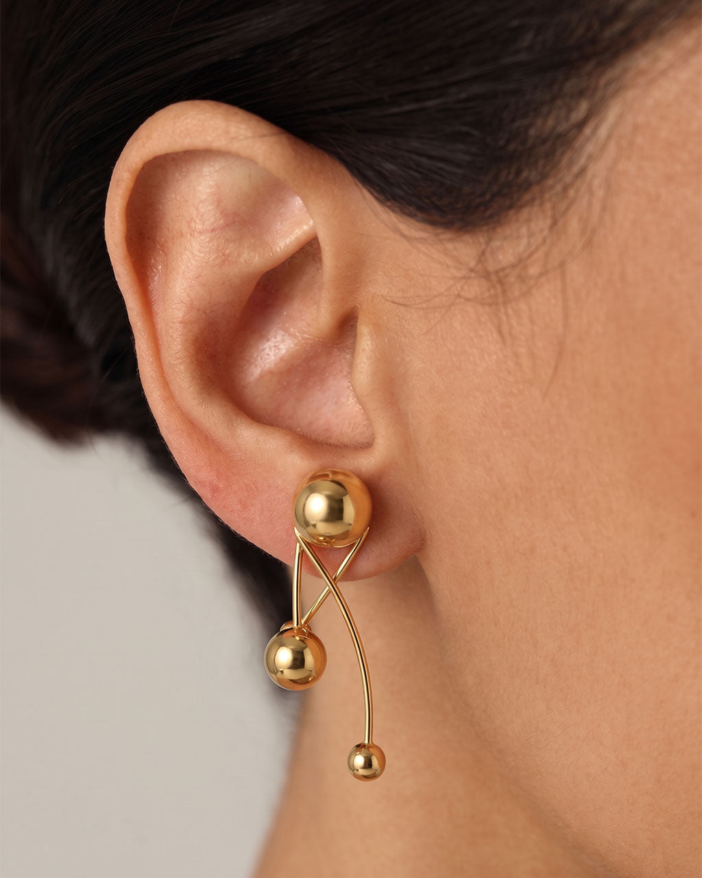 Floating Ball Linear Drop Waterproof Gold Earrings