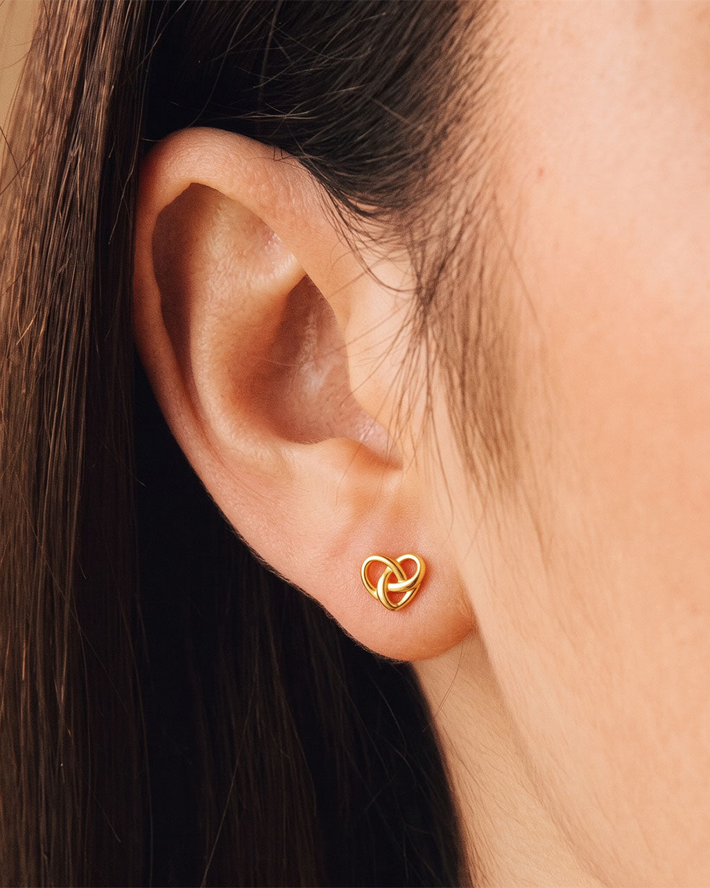 Intertwined Heart Piercing Waterproof Gold Earrings