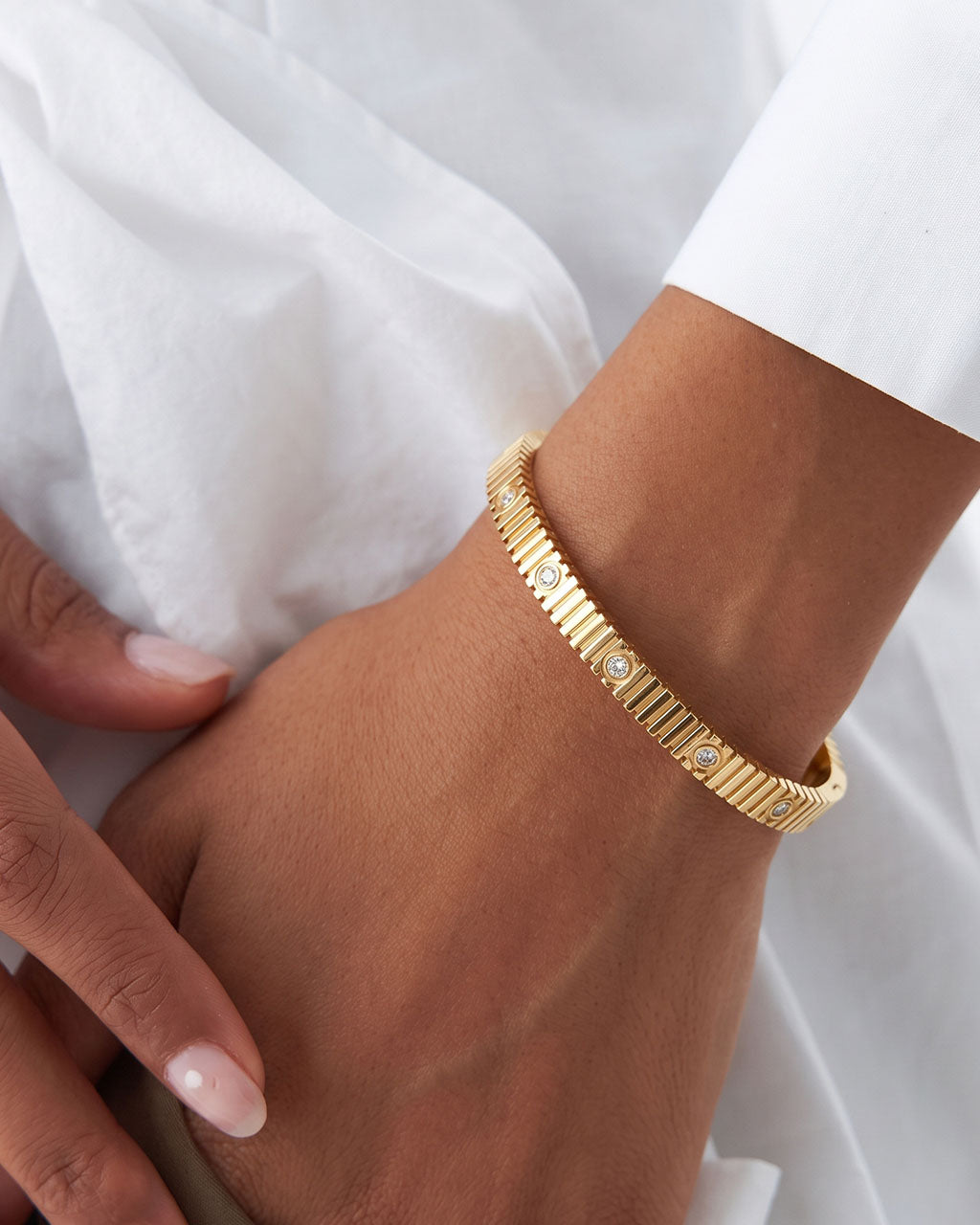 Ridged Simulated Diamond Station Waterproof Gold Bangle