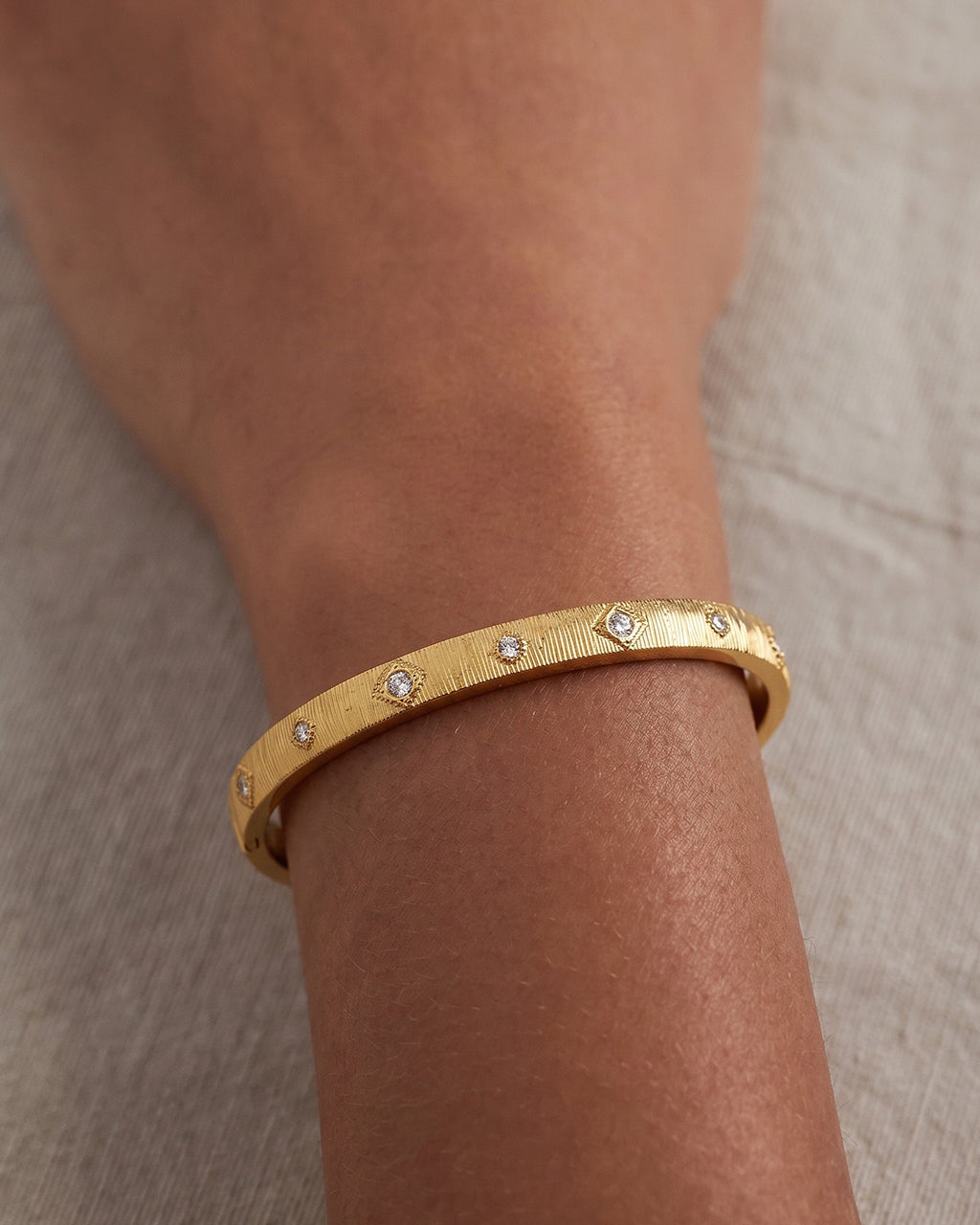 Riggle Oval Simulated Diamond Waterproof Gold Bangle